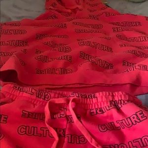 Culture jumpsuit. Fits snug. Comes with the jacket